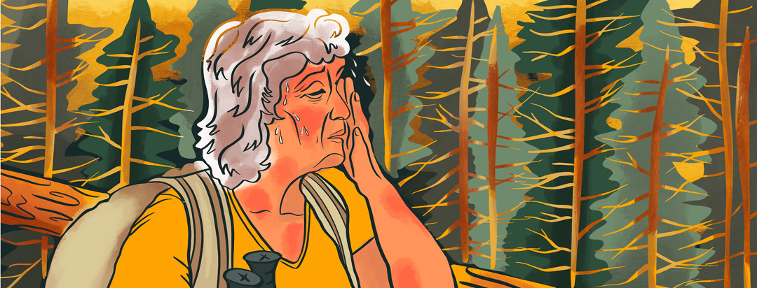 An older woman hikes through the forest, wiping sweat from her brow as patches of eczema inflame on her moist skin.