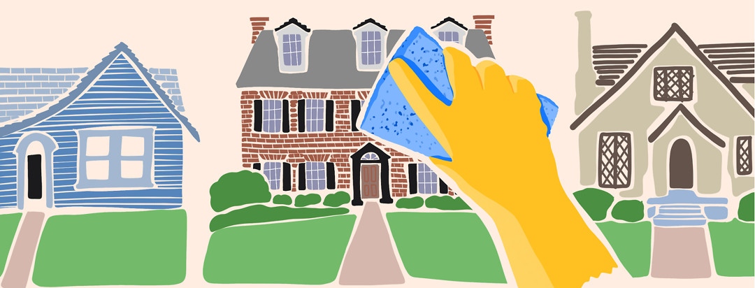 A row of houses with a cleaning gloved hand holding a sponge up to one of them.
