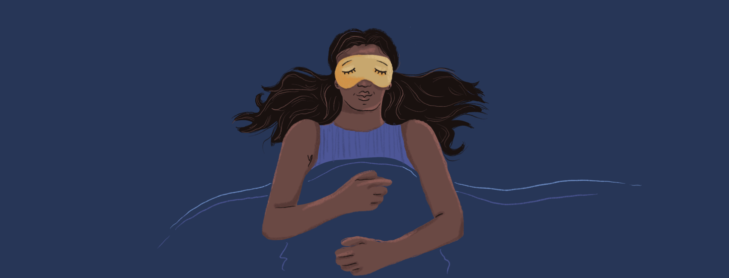 A woman sleeps peacefully and soundly with a sleep mask on.
