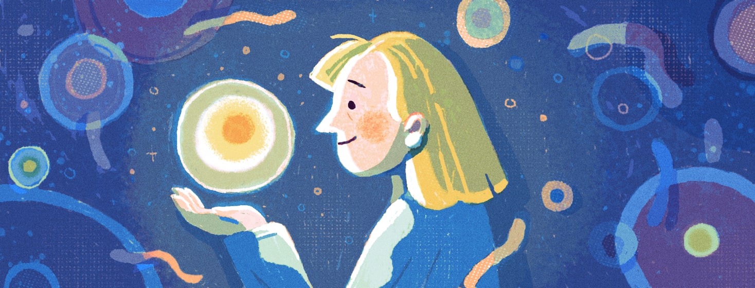 a woman holding a glowing orb smiling at it