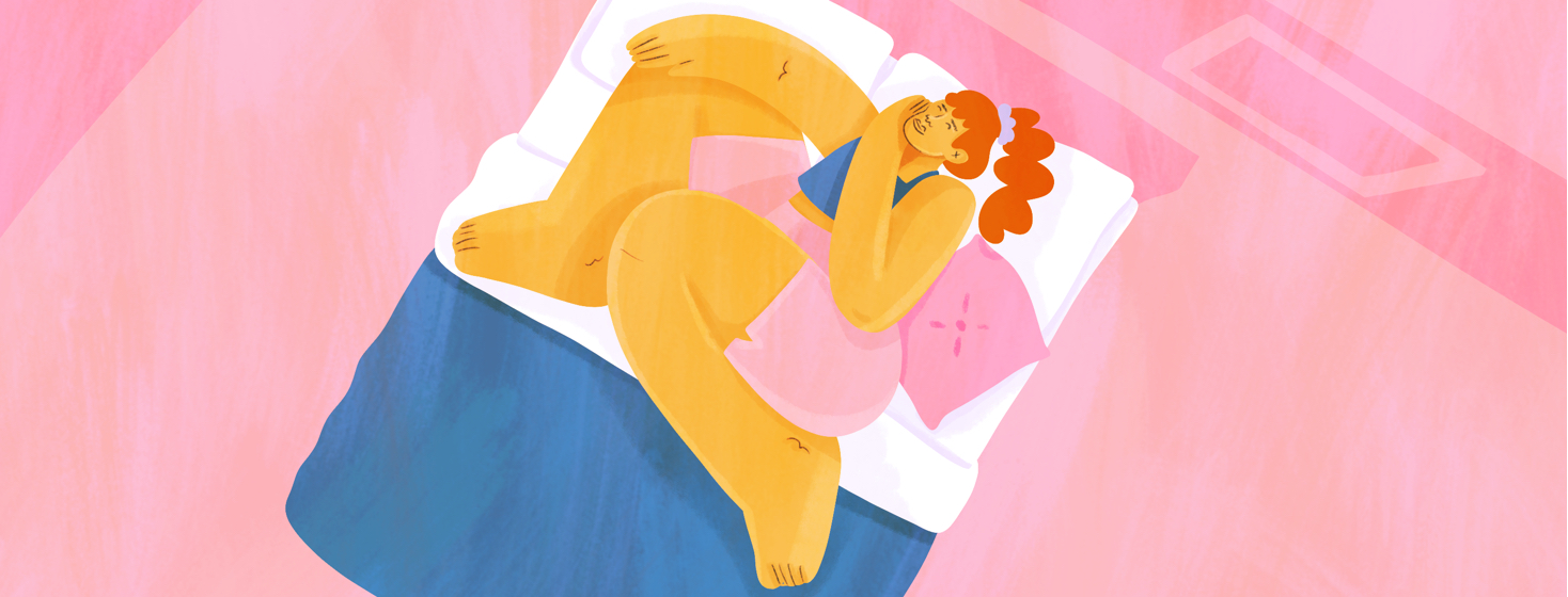 A woman sprawls out on her bed, resting.
