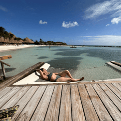 photo of someone relaxing by the ocean